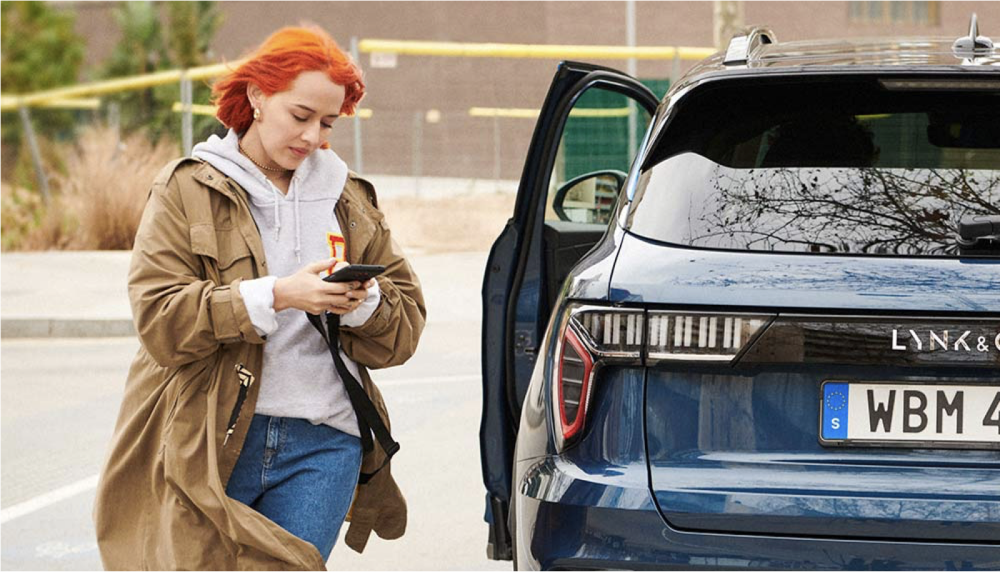 Woman using application for car specifications and purchases