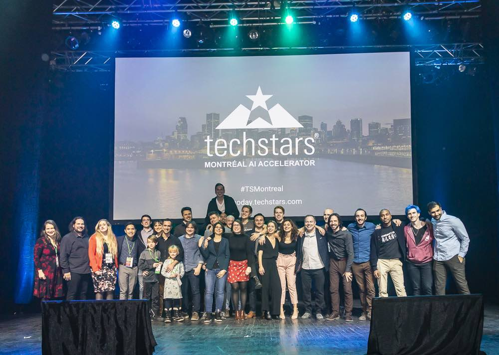 Corporate innovators attending Techstars accelerator demo day for startup scouting and partnership opportunities